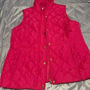 Kim Rogers pink vest.